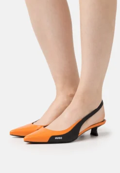 Hugo Alexis - Tacones - Red Eleven